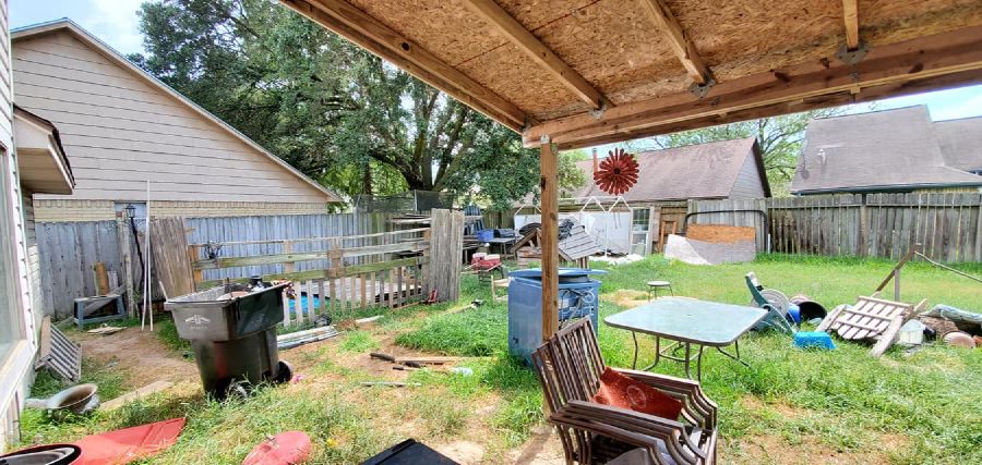 Covered patio before cleanout